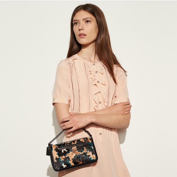 Coach Handbags - Coach haircalf nolita leaf print wristlet/mini bag
